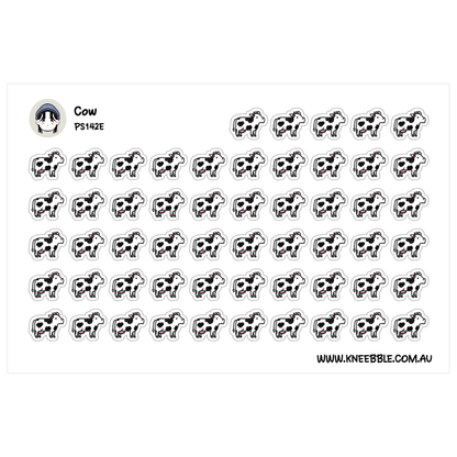 a grid of black and white cow stickers arranged in rows and columns.