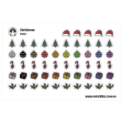 a collection of Christmas-themed stickers, including various ornaments, a Christmas tree, a Santa hat, and other festive elements.