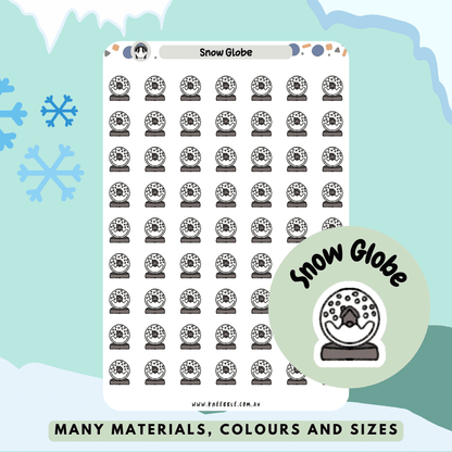 Stickers featuring snow globe designs, showcasing various winter scenes inside a glass dome, great for planner decorations or marking special events.